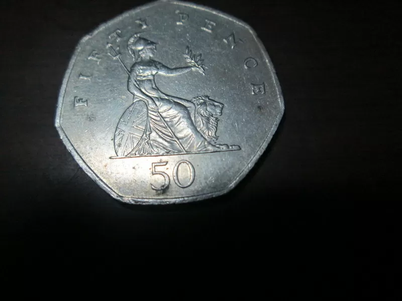 продам монету (fifty 50  pence 1997 года)